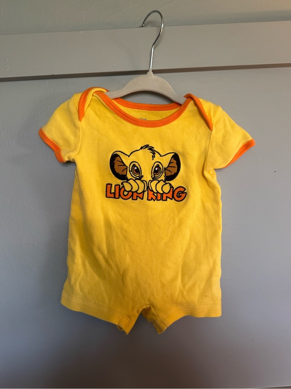 Disney Yellow & Orange Lion King Short Sleeve Baby One-Piece